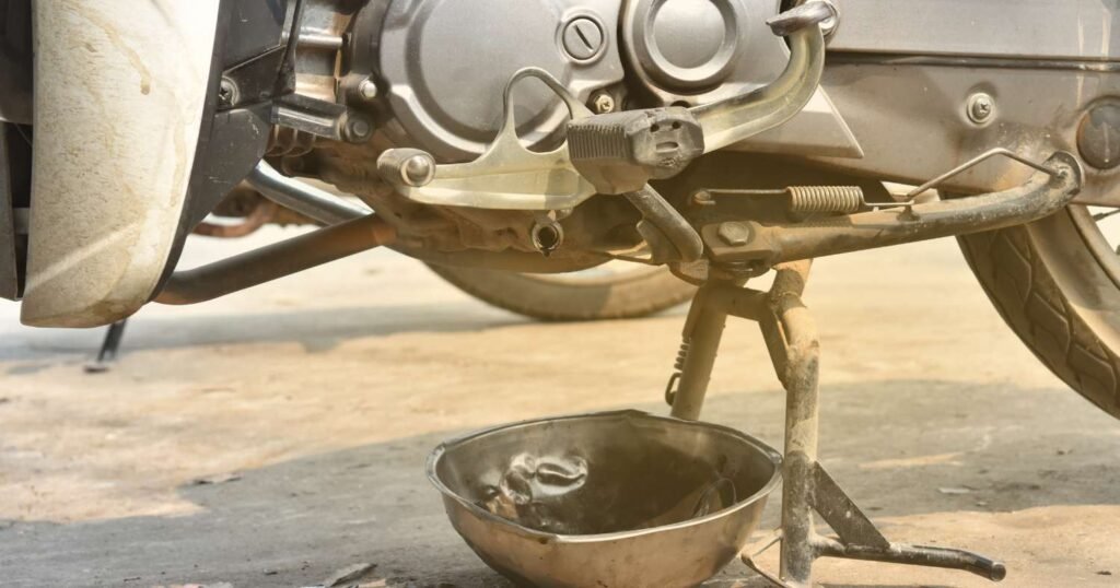 What are signs that my motorcycle oil needs changing?